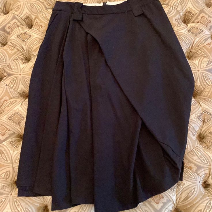 Very Good Pre-Owned Condition With A Sophisticated Edgy Style. I Believe “3” Is A Medium So Please Review The Photos For Sizing Measurements. Comes From A Smoke Free Home. Black Relaxed Draped Skirt For Formal Occasions, Black Formal Relaxed Draped Skirt, Formal Black Relaxed Draped Skirt, Chic Black Draped Skirt For Workwear, Chic Black Draped Flared Skirt, Black Asymmetrical Pleated Skirt For Evening, Fitted Black Draped Skirt For Work, Chic Black Draped Mini Skirt, Black Chic Draped Mini Skirt