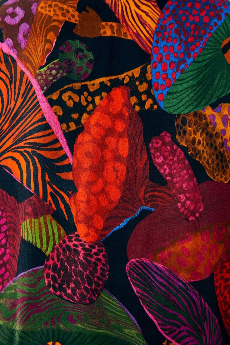 an image of colorful flowers and leaves on a black background with red, orange, green, blue, pink, yellow