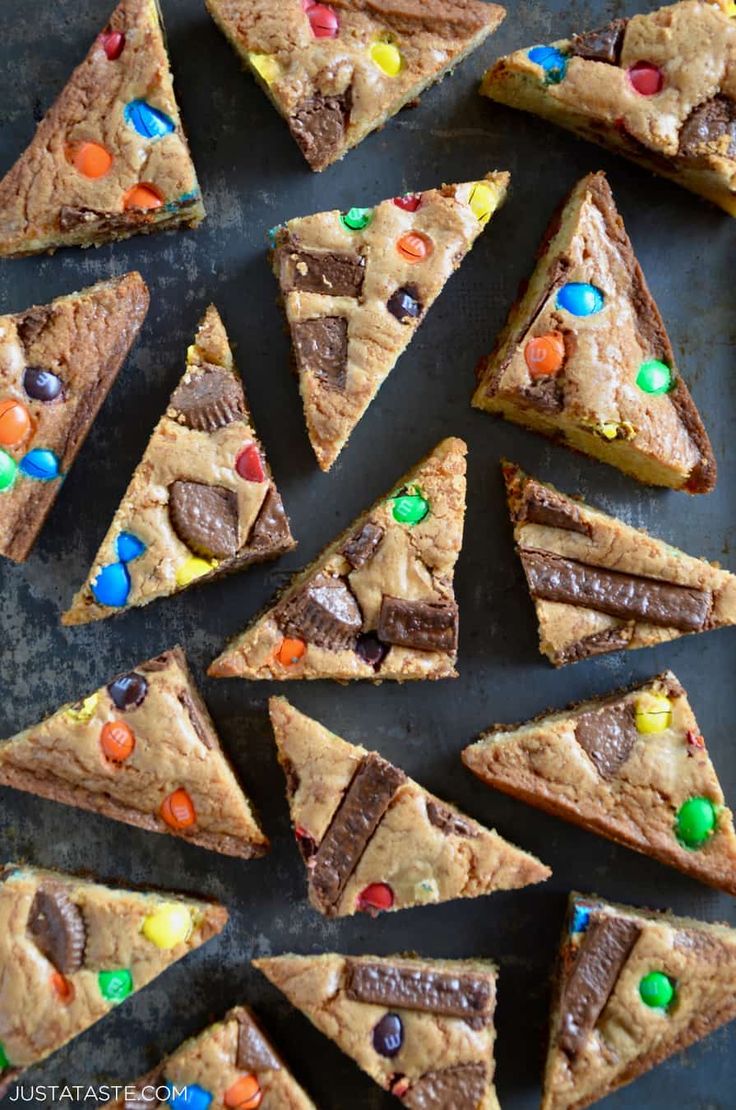 chocolate chip cookie bars with m & m candies on top