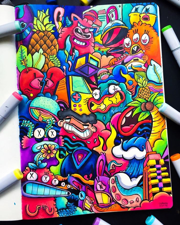 a drawing book with lots of colorful drawings on it