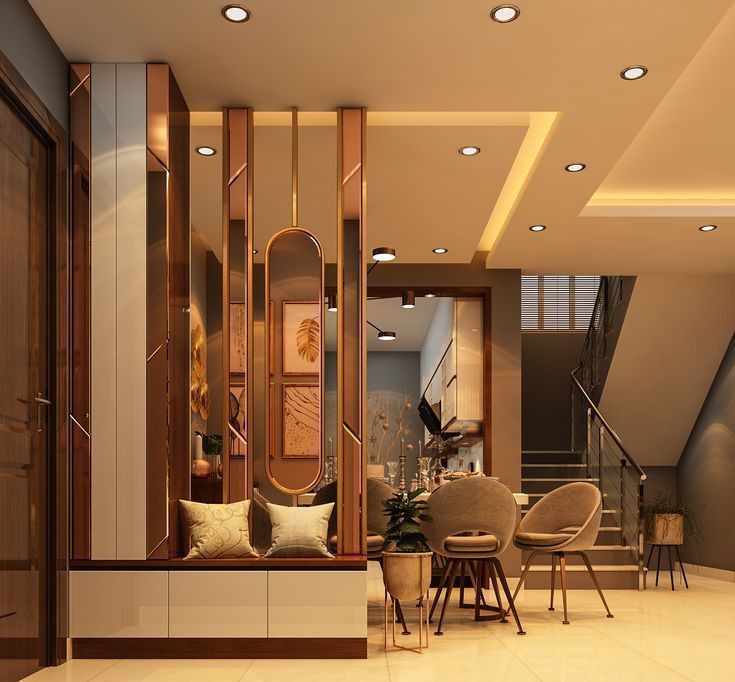 a living room filled with lots of furniture next to a stair case covered in mirrors