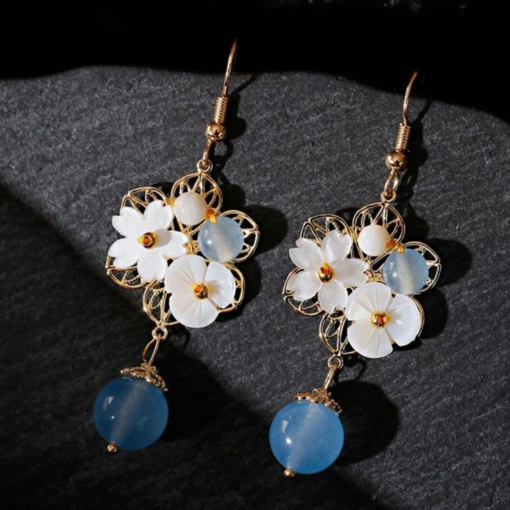 Gold Plated Flower Shell Hook Earrings Material: Gold Plated, Copper, Shell, Natural Stone Style: White/Blue First Picture Occasion: Anniversary, Engagement, Wedding, Gift, Party, Daily Wear Style: Boho Vintage Dangle Earring Bundle & Save Fast Shipping Offers Welcome Posh Ambassador Over 300 Love Notes Please Look At My Other Beautiful Jewelry Elegant Summer Jewelry With Flower Decoration, Elegant Summer Earrings With Flower Decoration, Elegant Light Blue Earrings For Summer, Spring Wedding Blue Jewelry, Blue Earrings With Flower Charm For Spring, Blue Flower Charm Earrings For Spring, Elegant Light Blue Dangle Flower Earrings, Blue Dangle Flower Earrings For Spring, Blue Flower-shaped Spring Jewelry