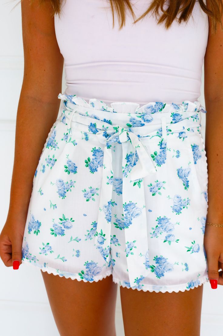 blue floral shorts ruffle waste tie waste side zipper scallop detail on the bottom Sorority Dresses, Custom Cat, Floral Shorts, Brand Ambassador, New Arrival Dress, Gift Accessories, Holiday Collection, Blue Floral, Side Zipper