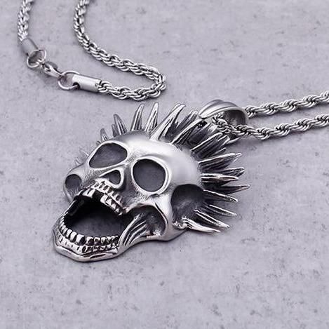 Even the dead have their dose of madness. This punk necklace with an eccentric cut is perfect for those who aren't afraid of other people's gaze! This punk skull necklace is a must for punk people, for people fond of Blink-185 or even Sum 41. As you may have noticed, it is totally painted in silver, making this necklace a unique and really attractive jewel for punk people and their black outfits. Also, as you can see, it has a foxtail bead attached to a screaming skeleton head with punk liberty Punk Necklaces For Halloween Concert, Punk Style Necklaces For Halloween Concert, Alternative Necklaces For Halloween Concert, Alternative Halloween Necklaces For Concerts, Gothic Necklace For Halloween Concert, Punk Style Jewelry For Halloween Concert, Grunge Necklaces For Halloween, Alternative Style Necklaces For Halloween, Alternative Halloween Necklaces