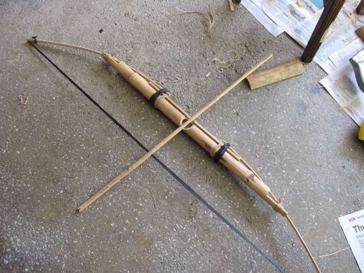 an arrow that is laying on the ground