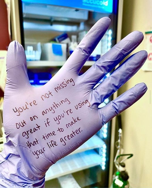 a gloved hand with writing on it that says you're not missing but an anything near if you're using what time to make your life greater