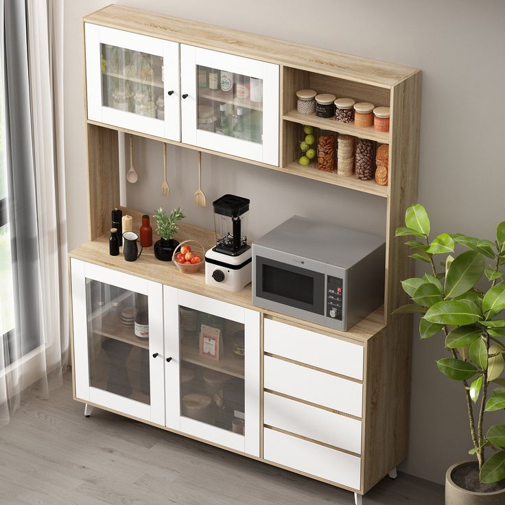 a kitchen area with a microwave, coffee maker and other items