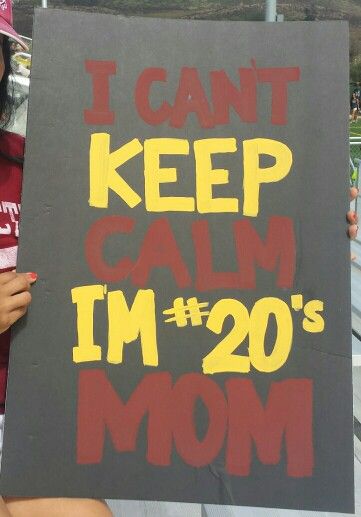 a woman holding up a sign that says i can't keep calm im 20's mom