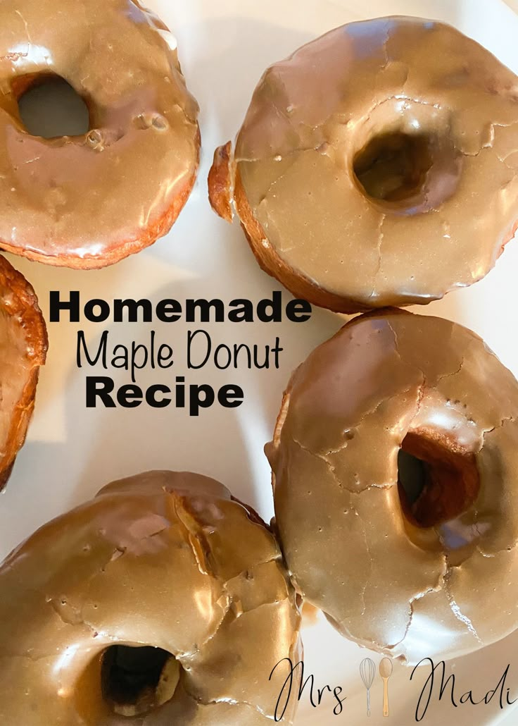 four glazed doughnuts on a plate with the words homemade maple donut recipe