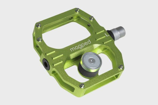 an image of a green pedal on a white background