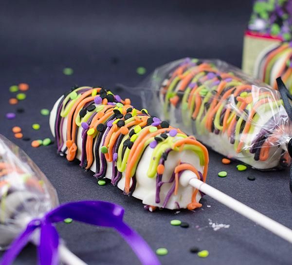 halloween candy lollipops with sprinkles on them