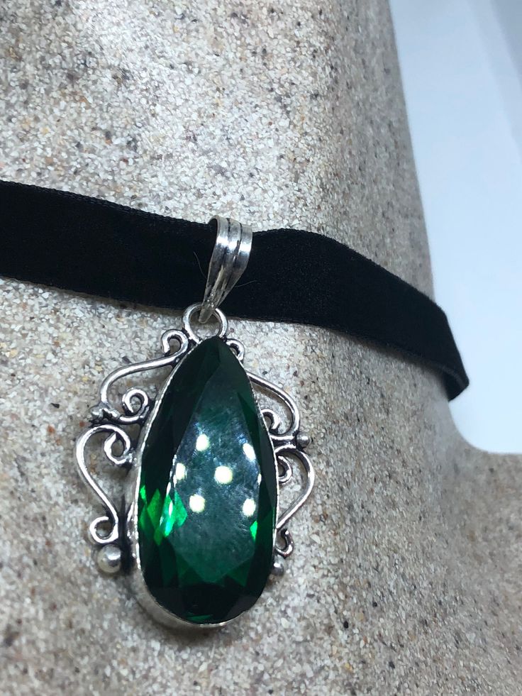 Handmade Vintage Green Glass  Crystal Choker Pendant
https://www.etsy.com/listing/644272871/handmade-vintage-green-glass-crystal Antique Emerald Jewelry For Formal Occasions, Elegant Green Jewelry With Large Pendant, Emerald Large Pendant Jewelry Gift, Silver Emerald Jeweled Necklace For Anniversary, Sterling Silver Jewelry For May Birthstone Party, Sterling Silver May Birthstone Jewelry For Party, Ornate Green Jewelry With Jewels, Victorian Jewelry With Jewels As Gift, Victorian Green Jewelry For Party