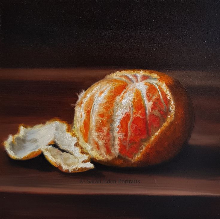 an orange that has been peeled and sitting on a table