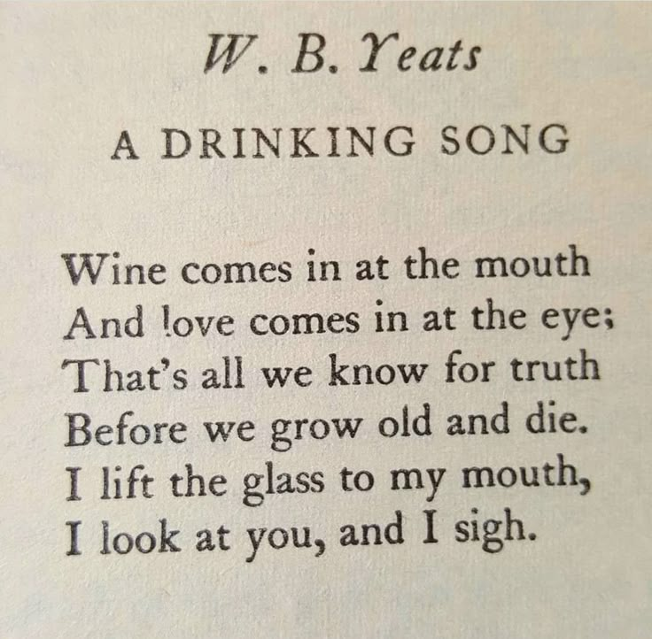 an open book with writing on it and the words w b yeats drinking song