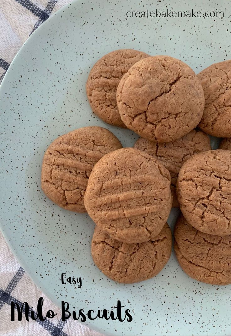 some cookies are sitting on a plate with the words easy molass biscuits in front of it