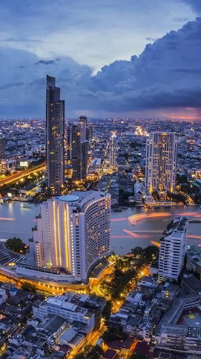 an aerial view of a city at night