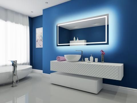 a bathroom with blue walls and white counter top, sink and bathtub in it