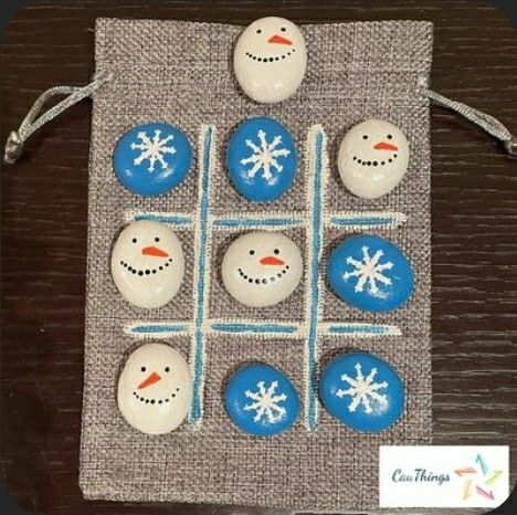 snowmen are painted on rocks in the shape of tic - tacquets