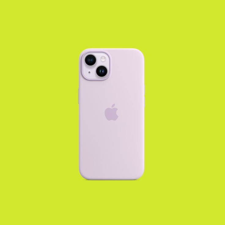 an apple iphone 11 in white on a green background with space for the camera to be seen