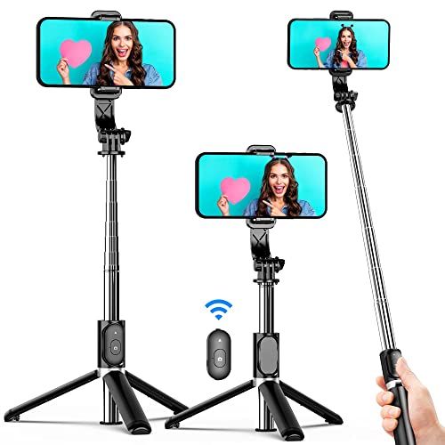 the selfie stick is being used to take pictures of people on their cell phones