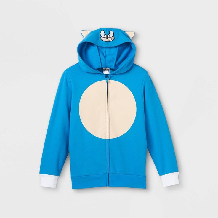 Make his seasonal wardrobe fun as ever with this Blue Sonic the Hedgehog Hooded Zip-Up Sweatshirt. This bright blue long-sleeve hooded sweatshirt made from soft and breathable material makes a comfortable layering option in his casualwear. It features a cozy hood with a Sonic the Hedgehog 3D face, along with a white circle print on front for a playful look. The zip-up design allows for quick and easy wear, while the handy side pockets allows him to carry his small essentials. Plus, the banded he Fun Hooded Sweatshirt With Drawstring Hood, Fun Cotton Winter Outerwear, Playful Hooded Hoodie For Fall, Fun Long Sleeve Cotton Hoodie, Fun Winter Hoodie With Drawstring Hood, Fun Hooded Winter Outerwear, Fun Cotton Hoodie, Long Sleeve Fun Hoodie For Fall, Fun Long Sleeve Hoodie For Fall