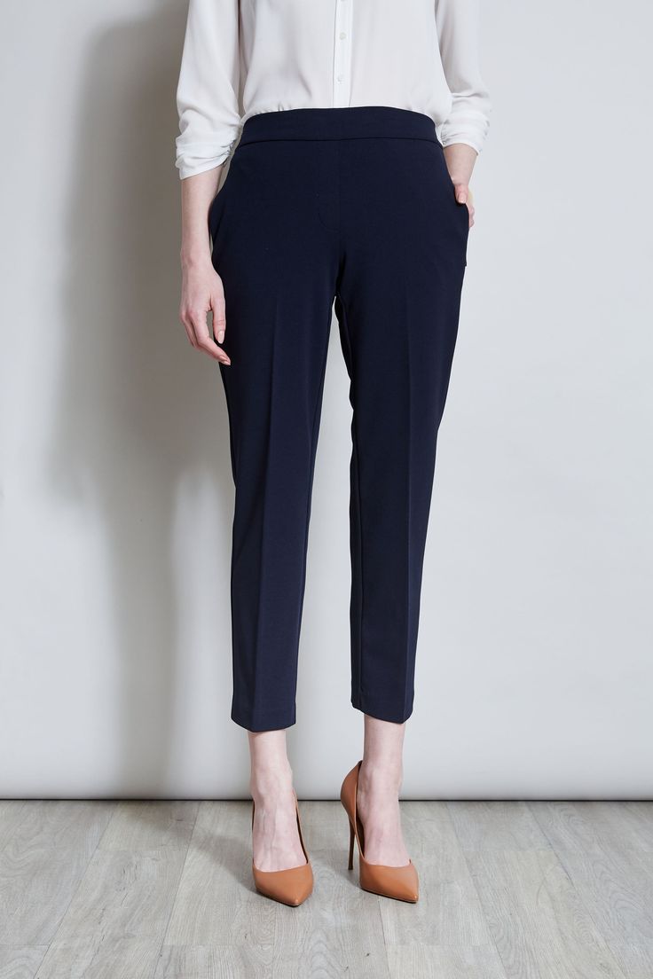 Sleek & timeless, this Slim Fit Ankle Pant is perfect for dressing up with its matching Single Button Blazer or pairing with Spring 's new knits and shirts. Featuring a slim leg & a pull on elastic back waistband, you will love the look & feel of these essential pants. T-Tahari Slim Fit Pant with Elastic Back Waistband Runs True to size Model is 5 '9 " and wearing a size S Imported Style #: THF17000A Essential Pants, Single Button Blazer, Slim Fit Pants, Slim Leg, Blazer Buttons, Pair Of Pants, Pull On Pants, Ankle Pants, Slim Legs