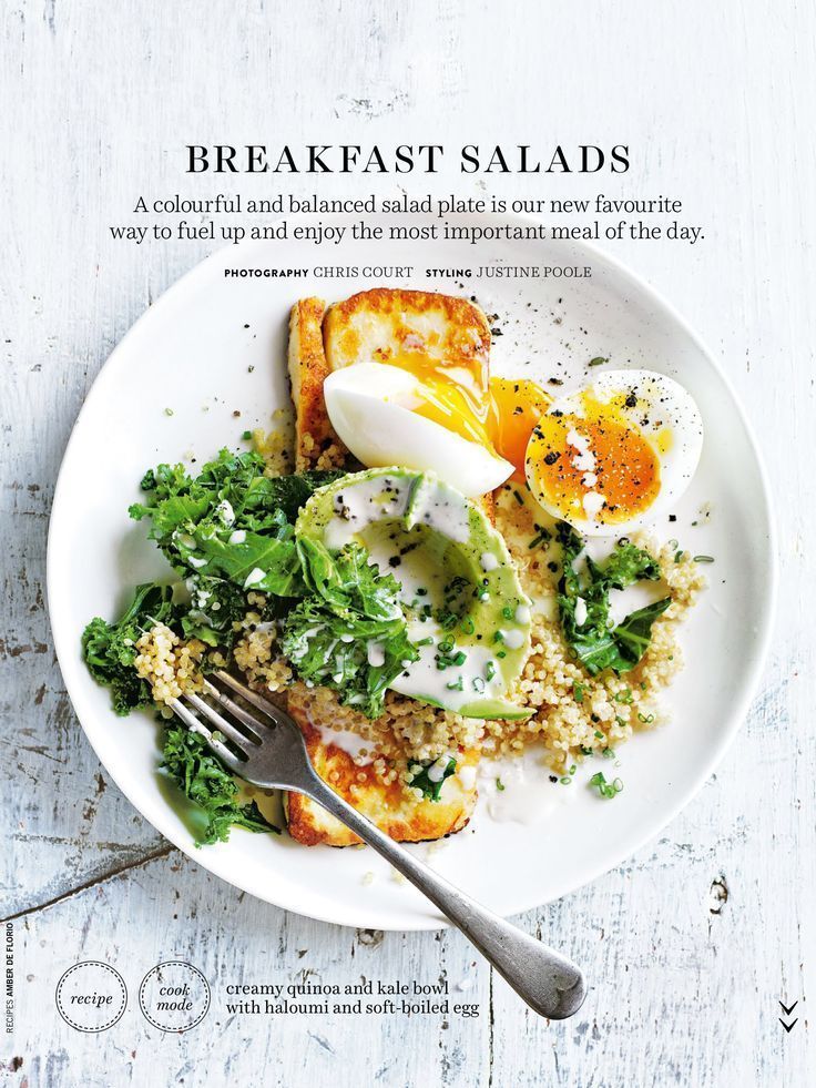 a white plate topped with eggs and vegetables