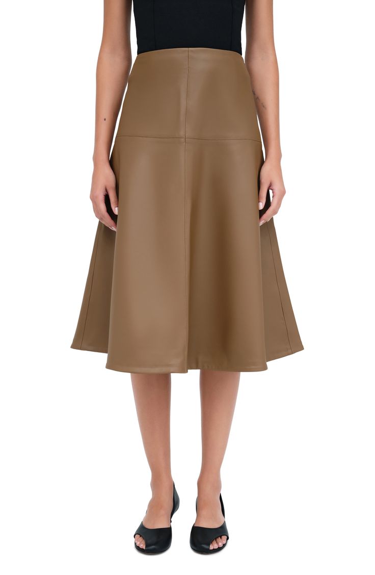 Glossy faux leather and architectural seaming add a modern mood to the classic A-line skirt. Hidden side-zip closure 93% polyester, 7% spandex Machine wash, line dry Imported Leather A Line Skirt, Vegan Leather Skirt, Work Week, Faux Leather Skirt, Health Insurance, A Line Skirt, A Line Skirts, Side Zip, Leather Skirt