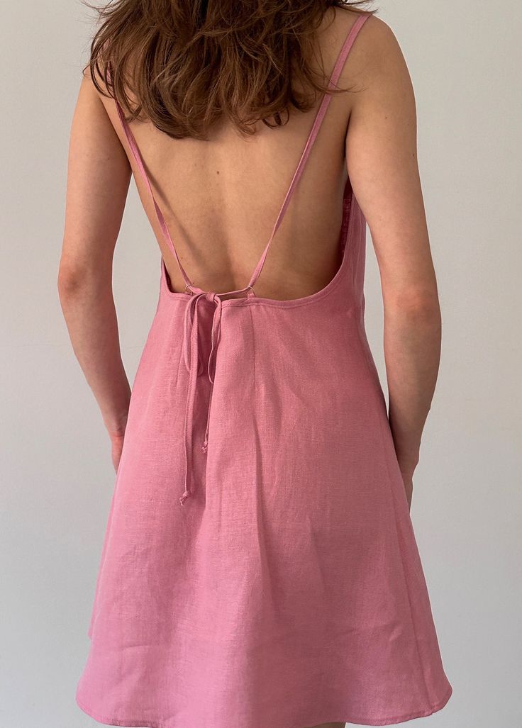 Pink linen dress, Linen backless dress, Summer mini dress for women, Sleeveless strappy dress, Open back strap dress, Sundress with slit Handmade linen dress suitable for any occasion in the summer season. It's a must-have dress for all-day, casualwear, and beachwear - perfect for your vacation. Linen makes the best micro-climate of the skin, is breathable, and absorbs moisture and perspiration. The straps in this model are adjustable and you can tie them in different ways and at the length that suits you the most. It also allows adjusting how high the neck is. It is super comfortable to wear yet a fashionable sundress, minimalist and simple. ■ color: pink ■ material: 100% linen ■ style: - Mini-length dress - No sleeves - Low back - Adjustable spaghetti straps - Relaxed fit - Double-lined Back Strap Dress, Strappy Backless Dress, Micro Climate, Pink Linen Dress, Backless Dress Summer, Summer Mini Dress, Dress Open Back, Strappy Dress, Linen Mini Dress