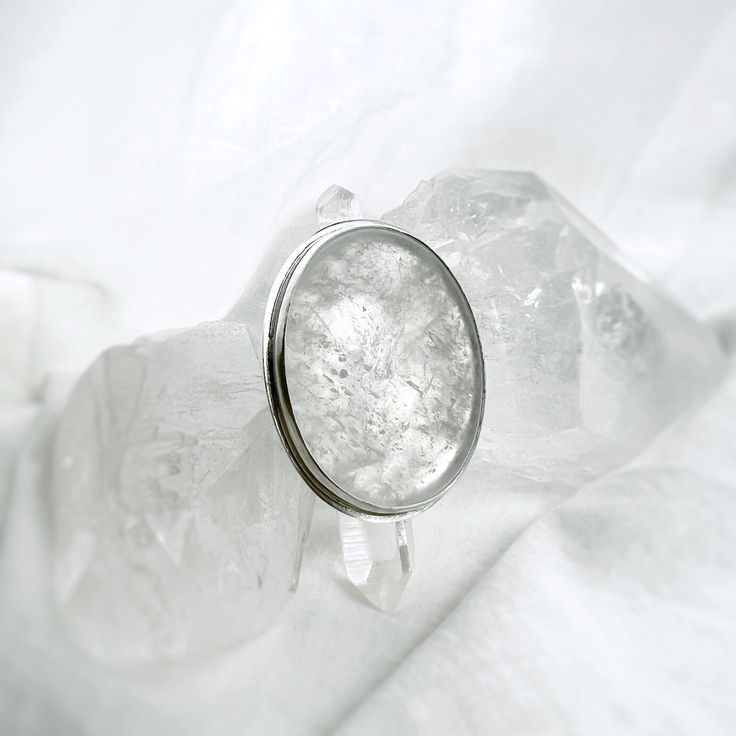 Clear Quartz Statement Ring When your style is crystal clear. Clear Quartz set in Sterling silver. US 8.5-9ish Modern Silver Sterling Silver Crystal Ring, Silver Quartz Jewelry, Modern Sterling Silver Crystal Ring, Minimalist Silver Crystal Ring For Formal Occasions, Formal Silver Crystal Ring With Halo, Modern Silver Crystal Sterling Silver Ring, Gift Crystal Ring In Sterling Silver, Anniversary Sterling Silver Crystal Ring, Minimalist Silver Oval Crystal Ring