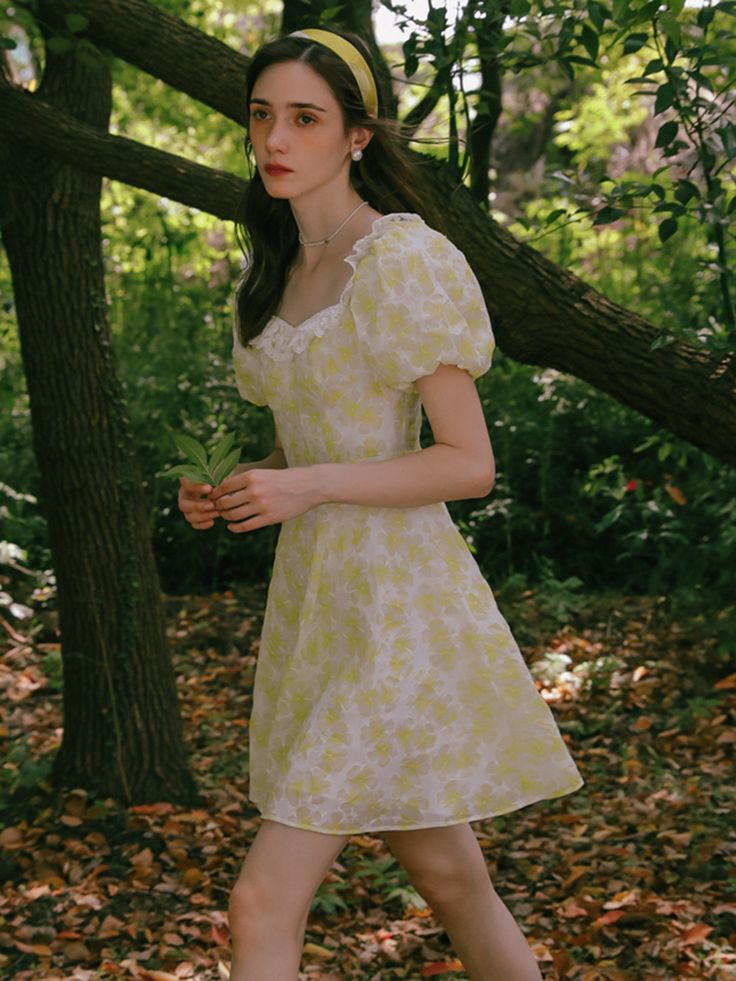 Editor'snotesThisdress features a femininity and creates a delightful mood. The dress is designedwith a lightweight and breathable fabric, allowing for a comfortable and airyfit. It showcases a flattering silhouette that enhances the natural stylishsummer look. - Feminine yellow flower pattern printing - Puff and banding detail on shoulder and back - Pair witha jacket, or adding accessories to enhance romantic mood Measurements(in.)ONE SIZE(XS-M)- Length: 32.68 in- Chest: 33. Green Flower Dress, Romantic Mood, Green Flower, Flower Dress, Yellow Flower, Green Flowers, Flower Dresses, Flower Pattern, Yellow Flowers