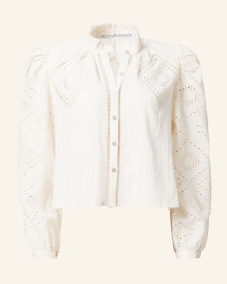 Crafted from cotton, our white eyelet shirt has long puffed sleeves and a ruffled collar. Eyeleted with diamond-shaped designs, the shirt has a mother-of-pearl button front and hand embroidery. If you love the Annabel, try the Winnie Shirt, which is the same cut with short sleeves. This one-of-a-kind textile was embroidered by hand. Subtle variations are part of the unique beauty of the garment and a signature of the artisan's hand. Scout Guide, Eyelet Shirt, The Scout, Ruffled Collar, French Seam, White Eyelet, Long Puff Sleeves, Spring Tops, Puffed Sleeves