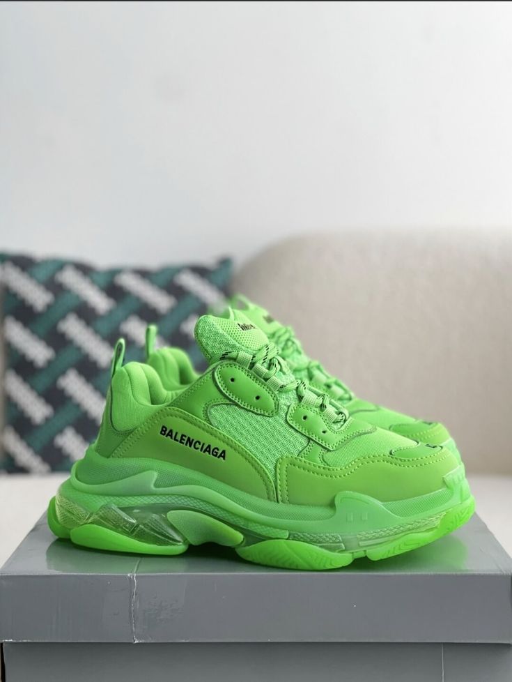 Turn heads and break boundaries with these neon green Balenciaga Triple S-inspired sneakers. The electrifying colorway and signature chunky sole make a bold statement, while the premium materials ensure lasting comfort. Embrace the avant-garde and step into the future of footwear. Green Athleisure Sneakers For Spring, Green Sneakers With Abzorb Midsole For Streetwear, Trendy Green Sneakers With Rubber Sole, Green High-top Chunky Sneakers In Sporty Style, Trendy Green Low-top Sneakers, Modern Green Sneakers For Spring, Green Sporty High-top Chunky Sneakers, Functional Green Sneakers With Abzorb Midsole, Green Sporty Platform Sneakers With Round Toe