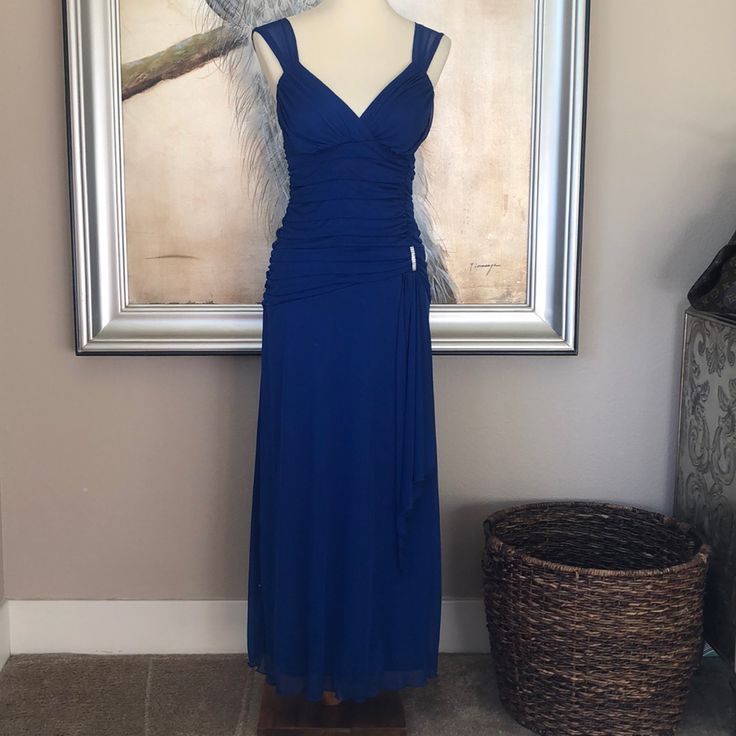 Brand New With Tags Stunning Sapphire Blue Ladies Dress With Diamond Accent Near Drop Waist Flows Size 4 Please Ask Questions...I Strive For 5 Star Reviews And Happy Buyers. It Takes Both Buyer And Seller To Communicate Kindly. This Is How I Provide For My Children, My Livelihood And Is My Job. I Am A Normal Mom. Thank You For Viewing My Closet...I Hope To See You Back Soon. Please Follow Me And Share My Listings. Blue V-neck Dress With Ruched Bodice, Blue V-neck Maxi Dress With Ruched Bodice, Blue Evening Dress With Ruched Bodice, Blue Maxi Dress With Ruched Bodice For Evening, Blue Ruched Maxi Dress For Formal Occasions, Formal Blue Maxi Dress With Ruched Bodice, Blue Ruched Formal Maxi Dress, Blue Ruched Dress For Formal Occasions, Blue Ruched Dress For Formal Events