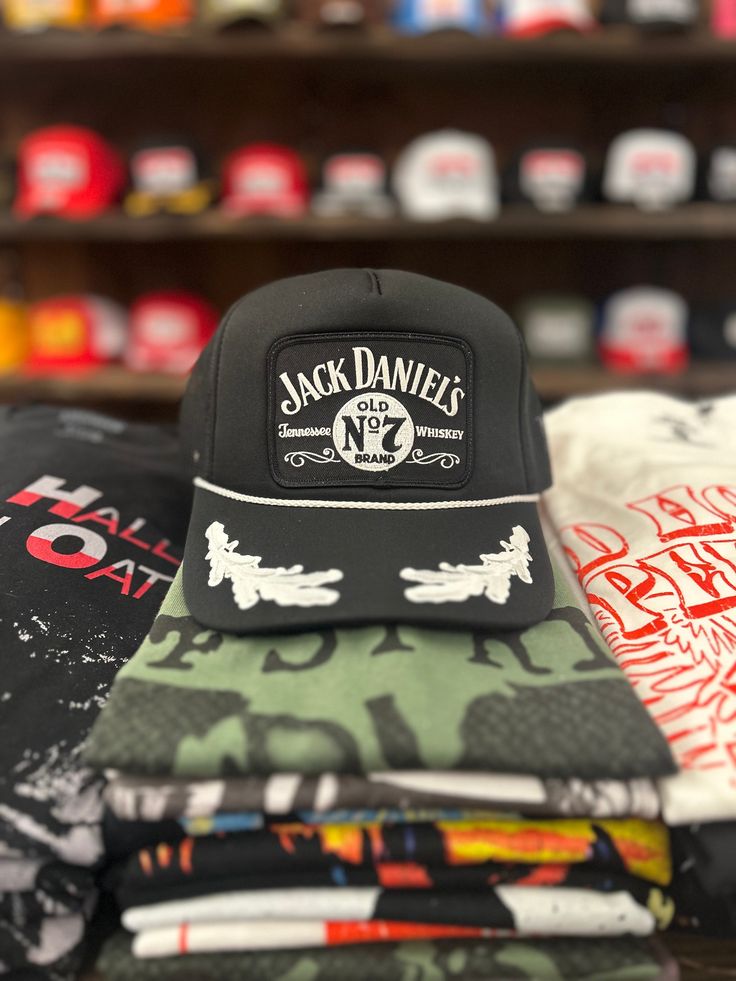 Classic Jack Daniels graphic trucker hat Adjustable snap back One size fits most Curved, moldable bill Casual Adjustable Trucker Hat With Graphic Print, Casual Snapback Hat With Graphic Print, Black Trucker Hat With Letter Print For Outdoor, Casual Baseball Cap With Graphic Print And Flat Brim, Casual Baseball Cap With Graphic Print, Casual Flat Brim Baseball Cap With Graphic Print, Black Hip Hop Trucker Hat With Curved Bill, Black 5-panel Trucker Hat Hip Hop Style, Black 5-panel Hat With Letter Print