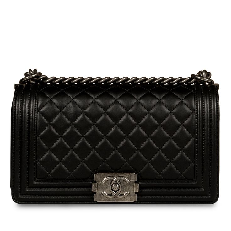 Chanel presents one of its highly-acclaimed and most sought after bags, the Chanel Boy Bag in size Old Medium in the wonderful and classic Boy Bag Combination of Black?ÿLambskin Leather and Ruthenium Hardware. As designed by Karl Lagerfeld, the Boy Bag collection was established to embody boyish charm and femininity. SPL Exterior   Black?ÿQuilted Lambskin?ÿLeather Old Medium size CC push-lock Antique Ruthenium?ÿhardware  Chain-link strap Immaculate condition - minimal/no sign of use   Serial number 22XXXXXX -?ÿYear of Production 2016/17  Interior   Black?ÿfabric grosgrain lining Single storage compartment  One large slip pocket Immaculate condition - no stains/marks  Full set - sold with dustbag, box and ity card  SPL  Height 15cm  Width 25cm  Depth 9cm Bag Collection, Chanel Boy, Timeless Handbag, Black Quilt, Chanel Black, Vuitton Bag, Exclusive Bag, Chanel Boy Bag, Vintage Bags