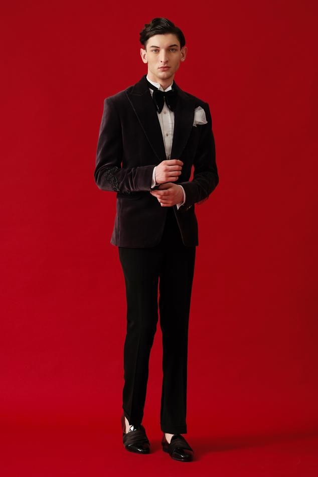 Black full sleeves tuxedo in velvet base with metallic embroidery and shawl lapel collar neckline. Paired with white cotton shirt, black trouser, bow, pocket square and waist band. - Aza Fashions Tailored Tuxedo Sets For Gala, Elegant Tuxedo For Gala And Festive Occasions, Elegant Festive Suits For Gala, Luxury Festive Tuxedo For Gala, Elegant Gala Suits For Festive Season, Elegant Gala Suits For Festive Occasions, Elegant Festive Gala Suits, Long Sleeve Tuxedo For Black-tie And Festive Events, Tailored Tuxedo For Gala And Festive Occasions