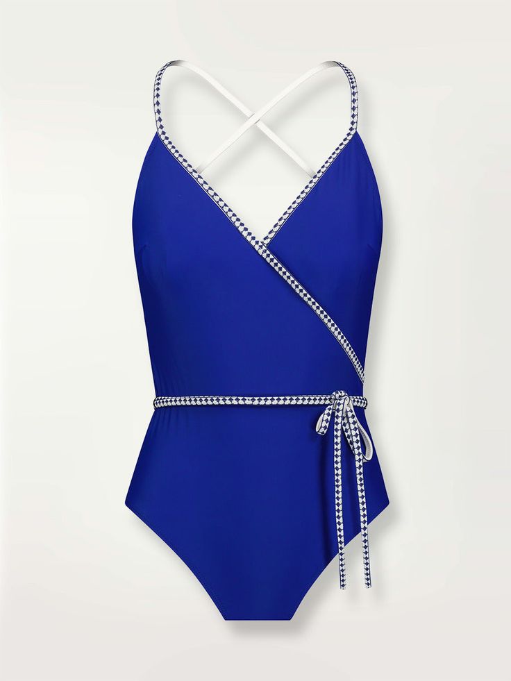 Product shot of the Lena Ballet One Piece  in bright neon blue adorned with navy and white diamond jacquard pattern on the trims Classic Swimwear, Swimwear 2024, Perfect Summer Outfit, Perfect Swimsuit, Surplice Neckline, The Triangle, African Pattern, Jacquard Pattern, Mediterranean Sea