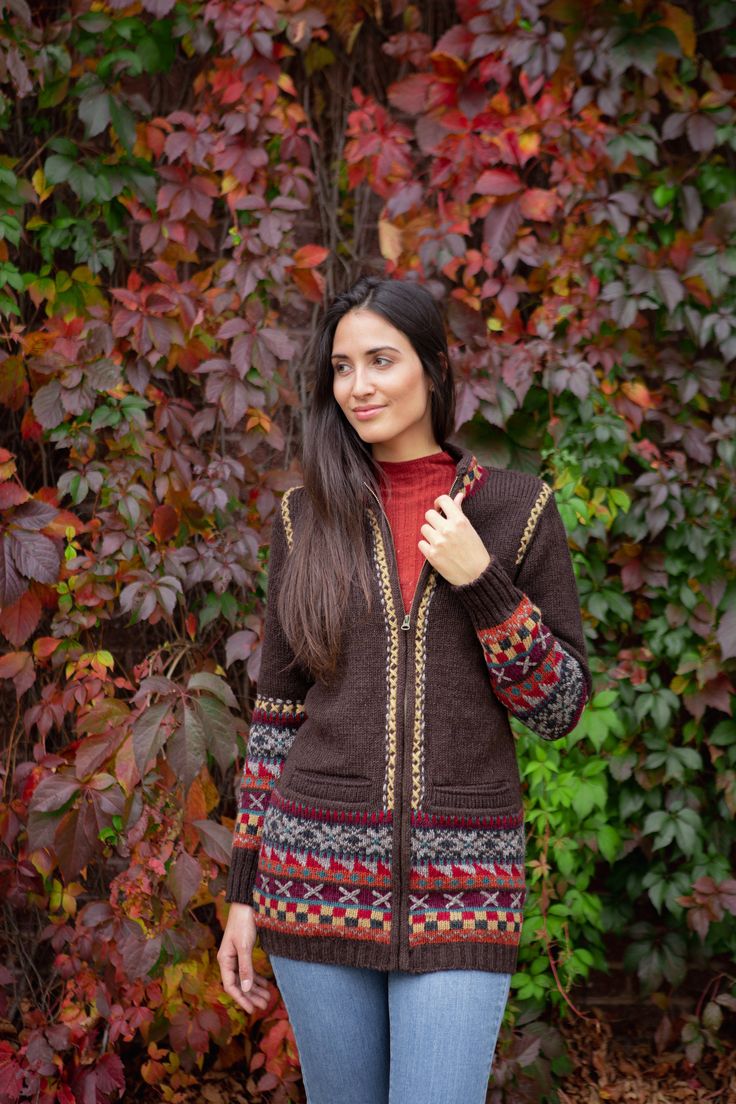 The Kirstin's practical three-quarter length and refined Fair Isle-esque patterns have made her an instant hit. Ideal for wearing as an outer layer, this sweater is lightweight and lined with natural cotton. Snowflake designs are accented with cross-stitching on the sleeves, along the shoulder seams, and down the full-zip front. Love her as much as we do? The Kirstin also comes in a skirt and across our full line of knitted accessories. 100% wool Cotton lined Handmade in Nepal Fair Trade Federat Knitted Accessories, Facebook Black, Knit Sweater Coat, Knit Coat, Fair Isle Knitting, Knitted Coat, Sweater Coat, Snowflake Designs, Fair Isle