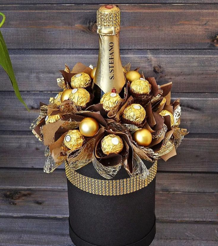 a bottle of champagne and some chocolates in it