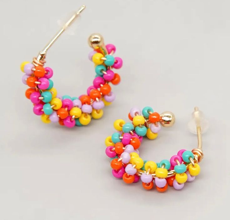 The perfect summer and vacation earring! These are bright and fun! Just about the size of a nickel. Handmade Multicolor Hoop Earrings For Spring, Summer Tiny Beads Small Hoop Earrings, Multicolor Bohemian Hoop Earrings For Spring, Summer Tiny Beaded Small Hoop Earrings, Colorful Summer Jewelry With Dangling Beads, Trendy Multicolor Beaded Earrings For Summer, Colorful Beads Earrings For Summer Vacation, Colorful Dangle Hoop Earrings For Summer, Pink Beaded Small Hoop Earrings For Summer