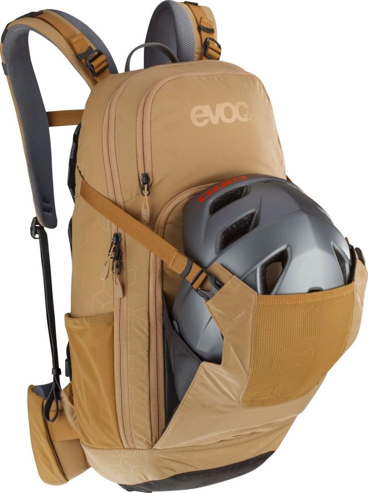 the back pack is packed with helmet and gear in it's pocket, as well as an additional backpack