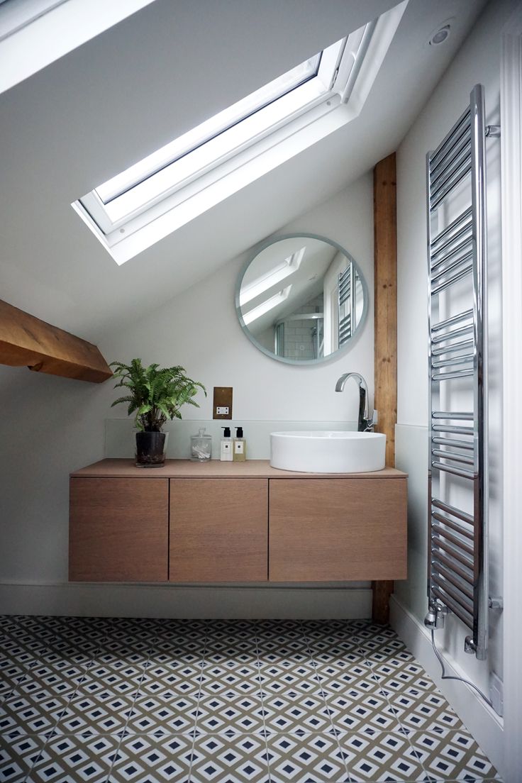 clever use of space in small attic bathroom Bathroom With Roof Window, Small Bathroom Vaulted Ceiling, Slanted Roof Bathroom Ideas, Sloped Wall Bathroom, Summerhouse Bathroom, Small Attic Bathroom Sloped Ceiling, Rooftop Bathroom, Small Sink Vanity, Primary Suite Bathroom