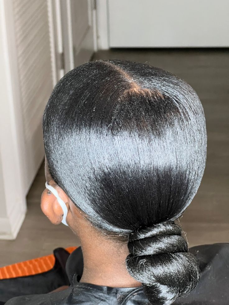 Black Low Bun Hairstyles, Slick Back Bun Middle Part Black Women, Sleek Low Ponytail Black Women Middle Part, Low Bun Knot Black Women, Sleek Low Bun Black Women Middle Part, Middle Part Top Knot Bun, Low Bun Middle Part Black Women, Low Knot Bun Middle Part, Low Bun Ponytail Black Hair