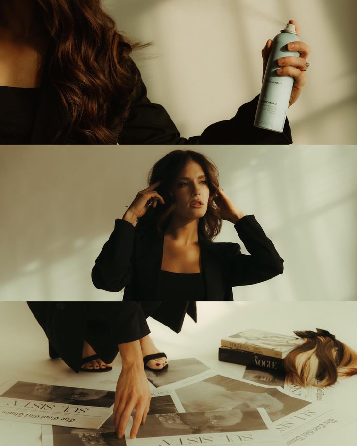 a woman sitting on the floor with her hair dryer in front of her face