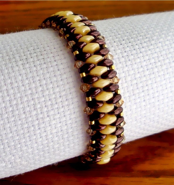 a close up of a bracelet on a napkin