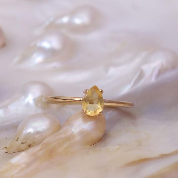 Hey, I found this really awesome Etsy listing at https://www.etsy.com/listing/927063705/pear-citrine-ring-14k-gold-citrine Fine Jewelry Yellow Gold Topaz Ring With Teardrop, Fine Jewelry Yellow Gold Topaz Teardrop Ring, Yellow Sapphire Wedding Ring With Birthstone, Oval Yellow Sapphire Wedding Ring, Anniversary Rings With Pear-shaped Rose Cut Diamonds, Pear-shaped Rose Cut Diamond Rings For Anniversary, Yellow Gold Yellow Sapphire Promise Ring, Wedding Rings With Yellow Sapphire Birthstone, Fine Jewelry Pear-shaped Citrine