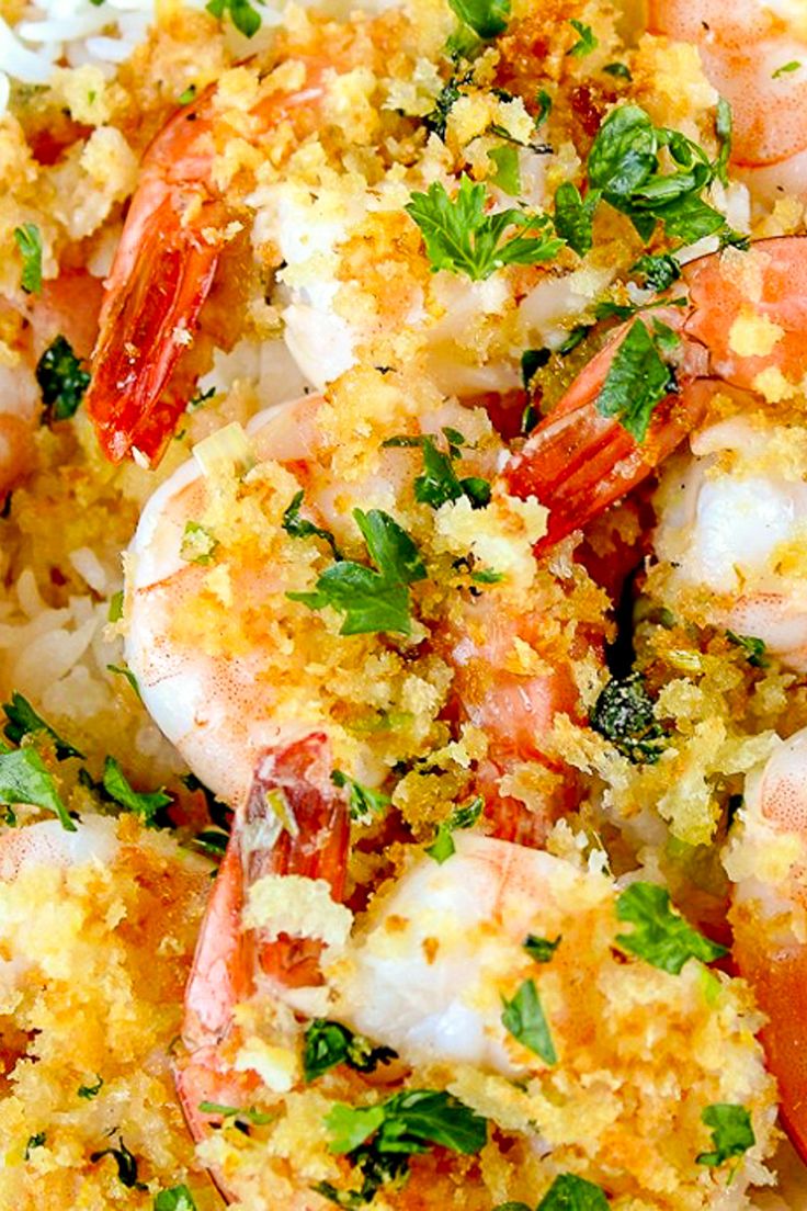 shrimp and rice dish with parsley garnish on top