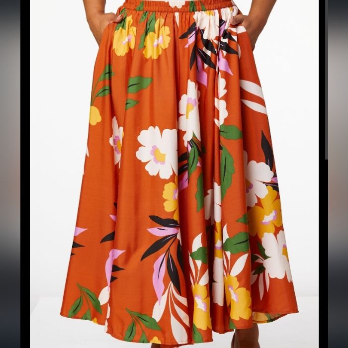 You'll Turn Heads In This Silky Skirt With Burnt Orange Background And Bold Floral Print. * Long Skirt * Elastic Waist * 100% Polyester * Machine Wash * Imported Casual Floral Print Maxi Skirt For Vacation, Floral Print Skirted Bottoms For Beach, Beach Skirted Bottoms With Floral Print, Vacation Floral Print Full Skirt Bottoms, Chic Orange Floral Print Skirt, Floral Print Long Skirt For Beach, Floral Print Full Skirt Bottoms For Vacation, Floral Print Full Skirt For Vacation, Orange Floral Print Skirt