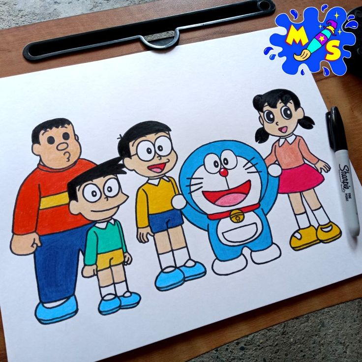 an image of cartoon characters drawn on paper with marker and pen next to it,